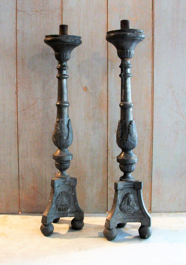 A PAIR OF PEWTER TALL ALTAR CANDLESTICKS